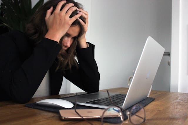 Frustrated business owner looking at confusing SEO reports